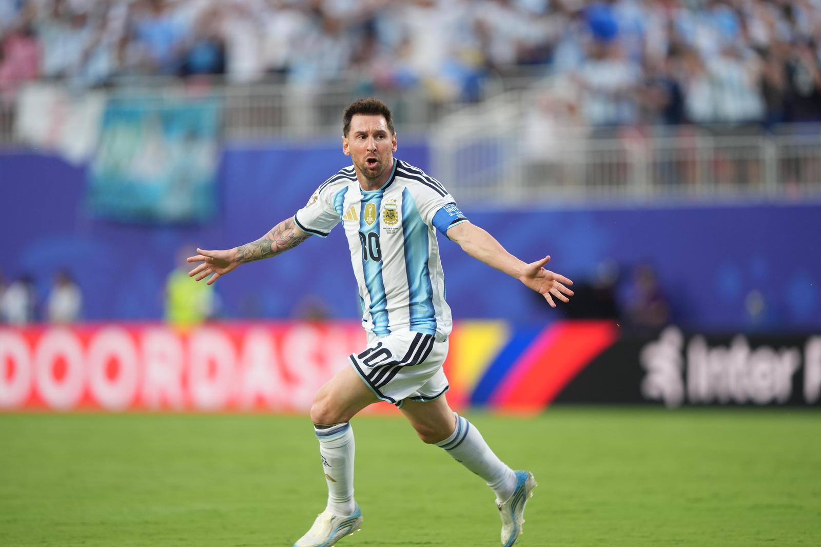 Messi celebrating on the pitch